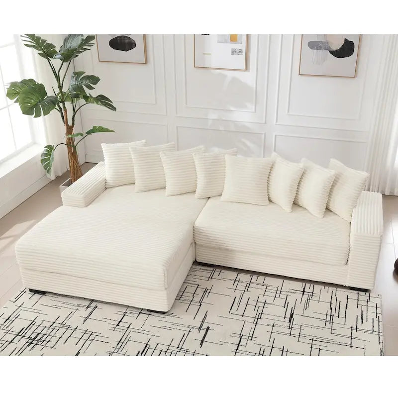 Canapé d'angle en velours côtelé beige 111 avec grande méridienne à gauche et 8 coussins décoratifs