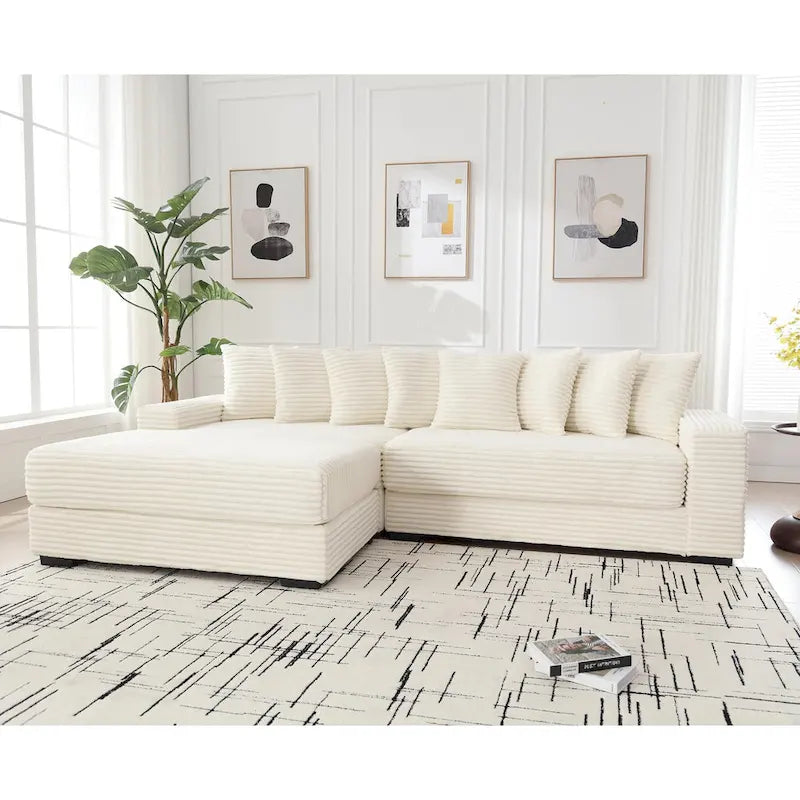 Canapé d'angle en velours côtelé beige 111 avec grande méridienne à gauche et 8 coussins décoratifs