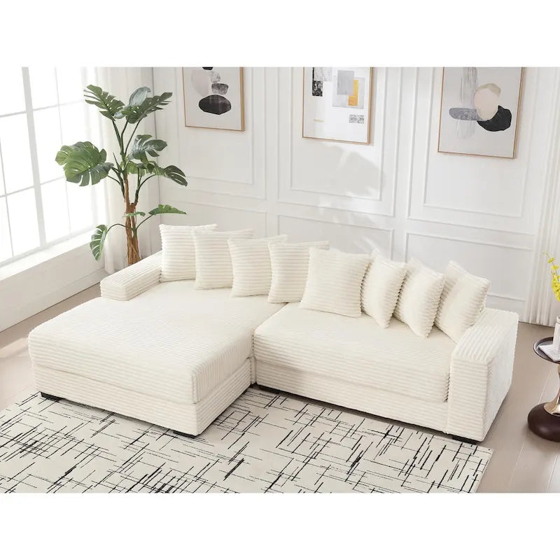 Canapé d'angle en velours côtelé beige 111 avec grande méridienne à gauche et 8 coussins décoratifs