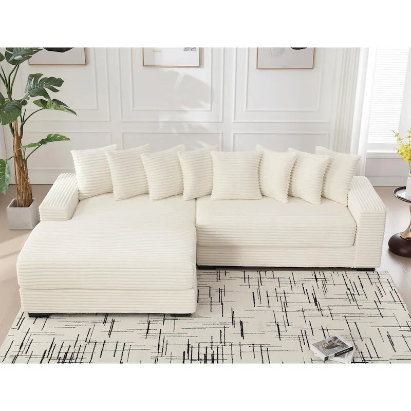 Canapé d'angle en velours côtelé beige 111 avec grande méridienne à gauche et 8 coussins décoratifs