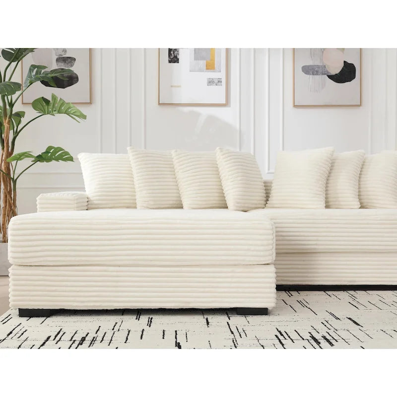 Canapé d'angle en velours côtelé beige 111 avec grande méridienne à gauche et 8 coussins décoratifs