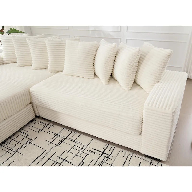 Canapé d'angle en velours côtelé beige 111 avec grande méridienne à gauche et 8 coussins décoratifs