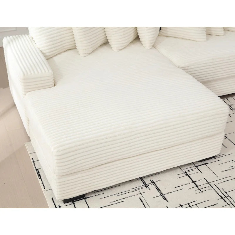 Canapé d'angle en velours côtelé beige 111 avec grande méridienne à gauche et 8 coussins décoratifs