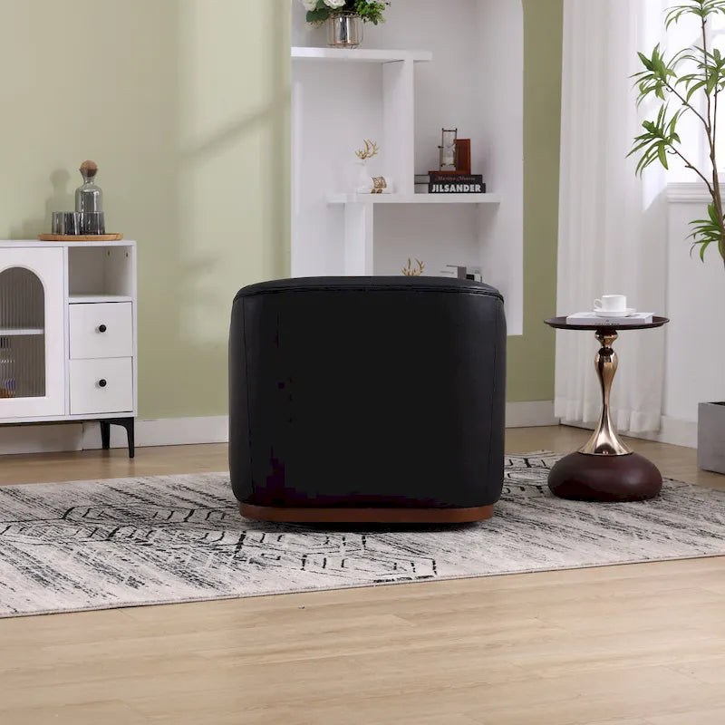 Fauteuil baquet pivotant en similicuir noir