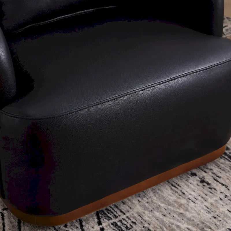 Fauteuil baquet pivotant en similicuir noir