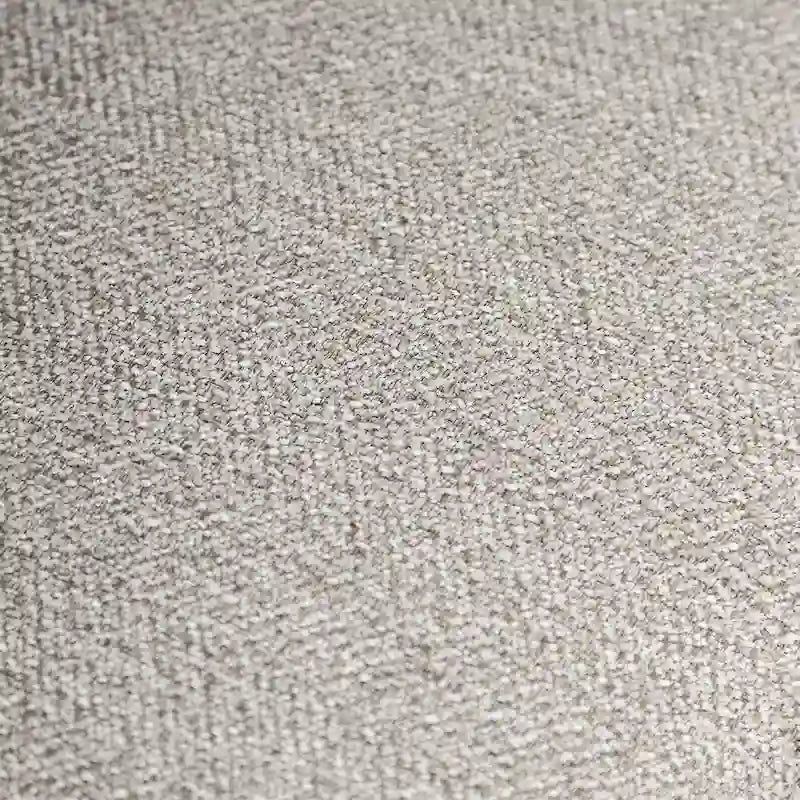 Canapé en tissu gris clair, orné de rivets
